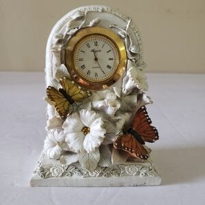 CK Collection mantle clock sculpture. 156